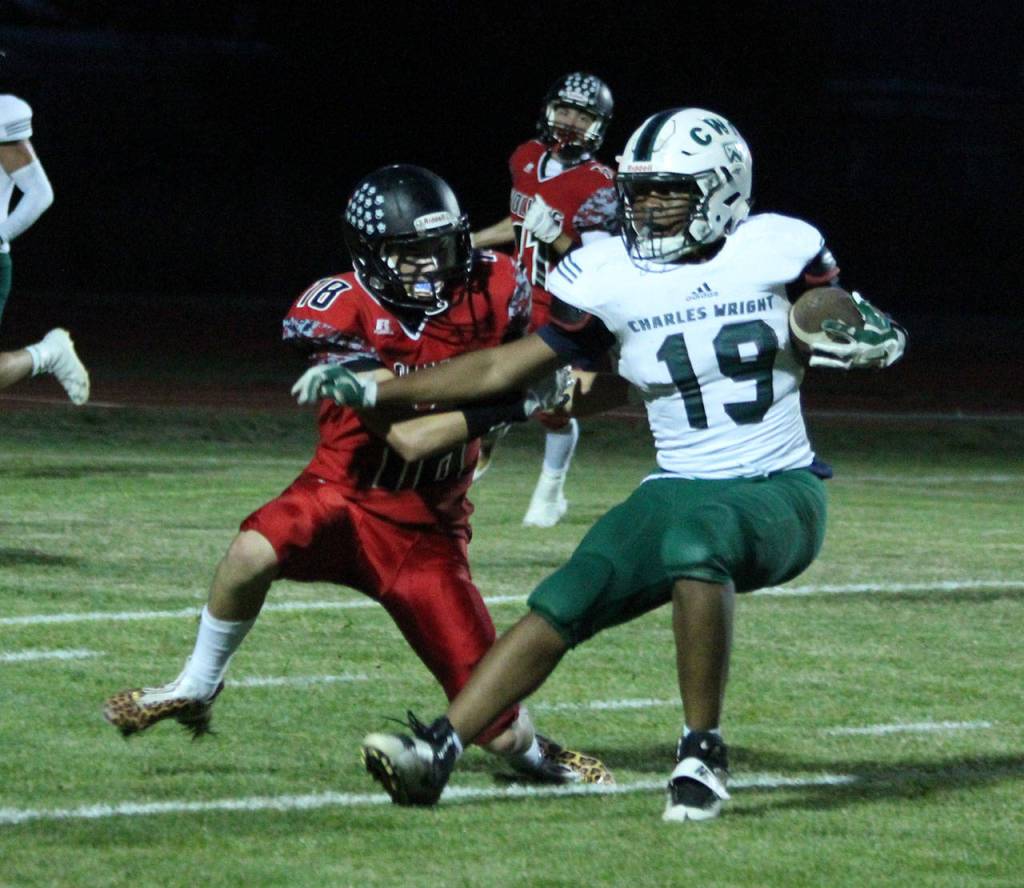 Sean Toomey-Stout tackles CWA&rsquo;s Noah Fields. (Photo by Jim Waller/Whidbey News-Times)