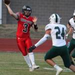 Coupeville quarterback Hunter Downes (3) throws over Charles Wright defender Michael Tucci. (Photo by Jim Waller/Whidbey News-Times)