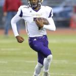 Dorian Hardin looks for some running room. (Photo by John Fisken)