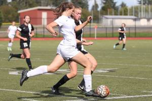 Wildcats earn first win / Soccer