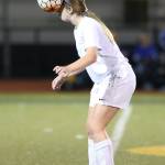 Peyton Rhyne uses her head to help Oak Harbor.(Photo by John Fisken)