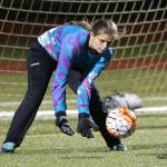 Wildcat keeper Trinity Stiles-Parden scoops up an Everett shot.(Photo by John Fisken)