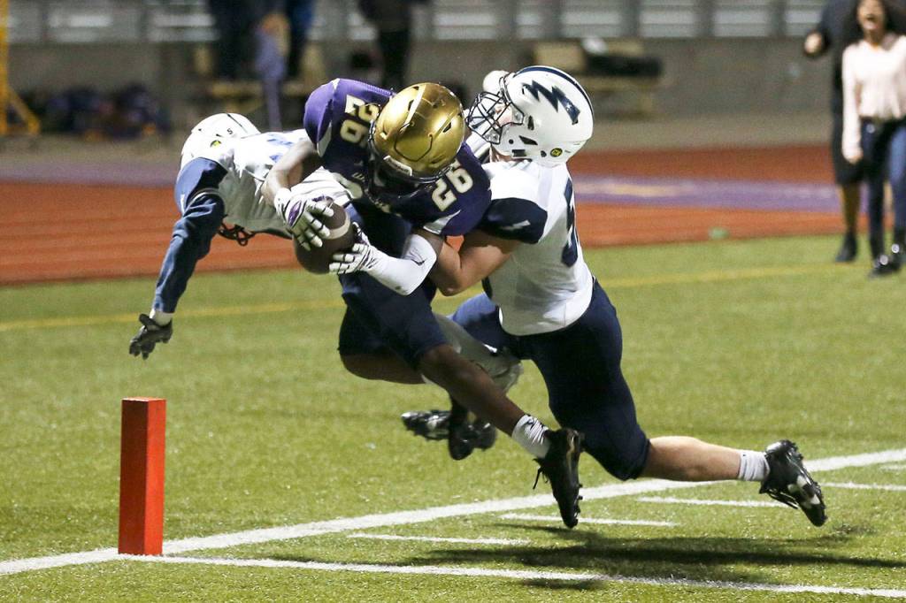 A thrill a minute: Wildcats weather Storm 21-20 / Football