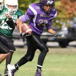 Aliyis Giles heads up field for the Oak Harbor Juniors. (Photo by John Fisken)