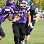 Pedro Barajas carries the load for the Oak Harbor Seniors.(Photo by John Fisken)