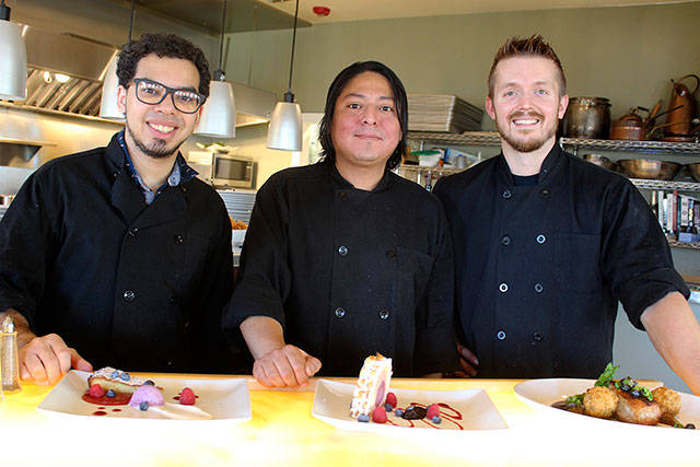 Showing off their creations at Frasers are Patrick Salgado, left, Michael Tsosie and Kyle Campbell.