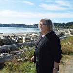Rowenna Houghton, a breast cancer survivor, takes in the view at Windjammer Park Monday morning. She recently moved to Oak Harbor after her cancer diagnosis delayed her move to the island by 13 years. Photo by Laura Guido/Whidbey News-Times