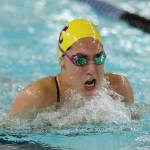 Senior Taliah Black swims to second place in the 100 breaststroke. (Photo by John Fisken)