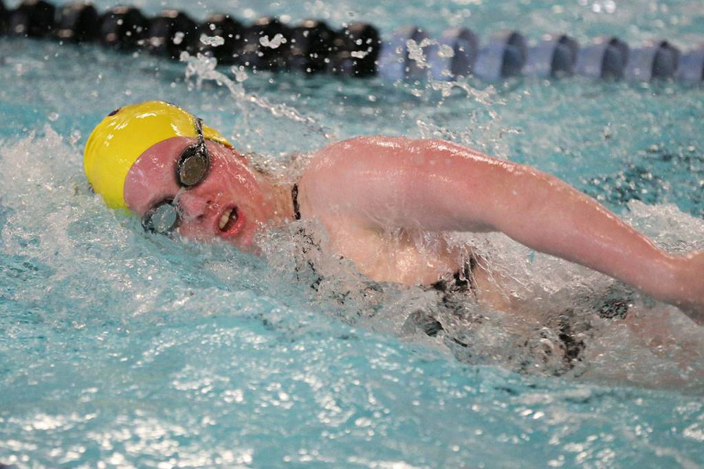 Senior Jillian Pape takes first in the 50-meter freestyle.(Photo by John Fisken)