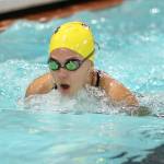 Noelle Ruiz picks up a team point by placing fifth in the 100-meter breaststroke.(Photo by John Fisken)
