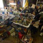 Justin Burnett/The Record &mdash; Clinton resident and picker John Norris sorts through items he found in a purchased storage unit.