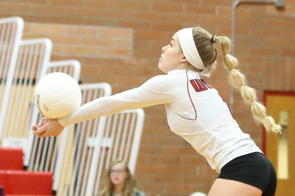 Hope Lodell, who had 25 digs in the match, passes for Coupeville.(Photo by John Fisken)