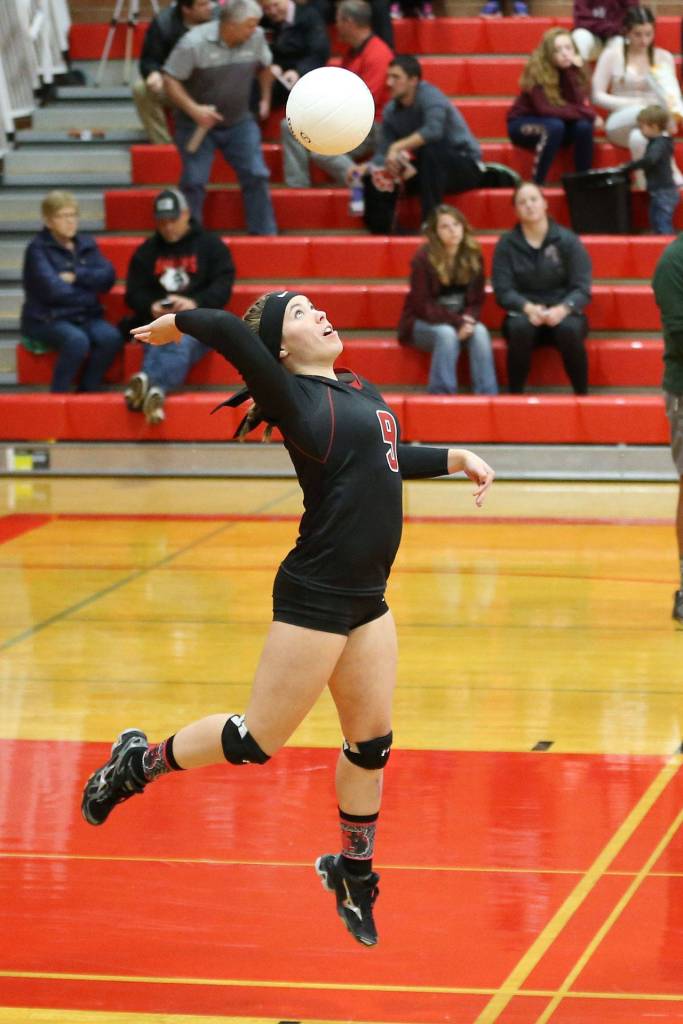 Coupeville&rsquo;s Lauren Rose puts the ball in play.(Photo by John Fisken)