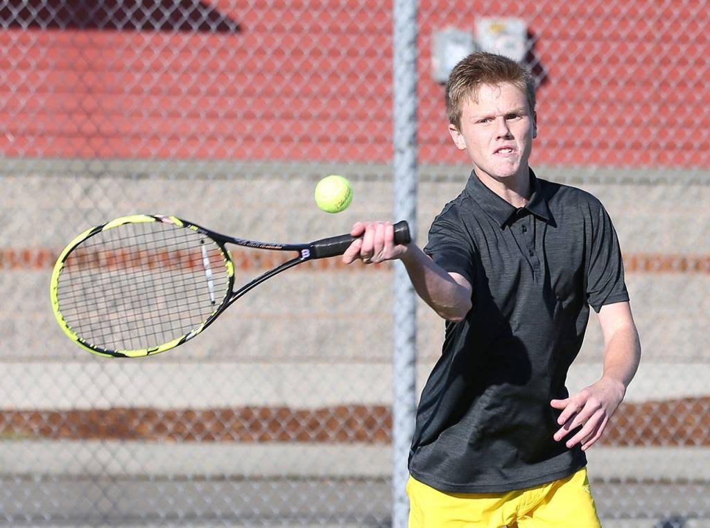 Mason Grove volleys for Coupeville against Sequim.(Photo by John Fisken)
