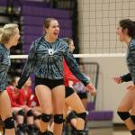 Cami Bristow, left, Samantha Hines and Kristina Tirado are all smiles after a Hines kill.(Photo by John Fisken)