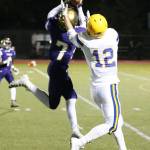 Dorian Hardin cuts in front of Ferndale&rsquo;s Jared Emmert for the first of his two interception Friday.(Photo by John Fisken)