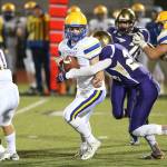 Photo by John Fisken                                Mac Nuanez completes a strip-sack of Ferndale quaterback James Hinson, causing a fumble recovered by Oak Harbor&rsquo;s Michael Fisken.