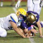 Comeback falls just short; Wildcats lose 29-28 in overtime / Football