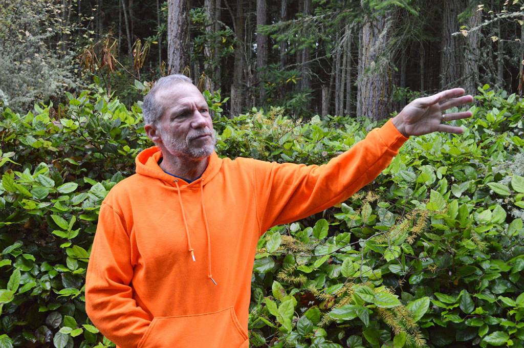 Fran Einterz explains where on the Kettles Trails he&rsquo;s encountered aggressive owls. He&rsquo;s been running on the trails for 40 years, but just in the last two has he noticed this type of behavior from the raptor. Photo by Laura Guido/Whidbey News-Times