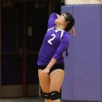 Sherilyne Fernandez puts the ball in play for Oak Harbor.(Photo by John Fisken)