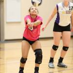 Ceirra Dean passes for Oak Harbor as Hailee Blau looks on.(Photo by John Fisken)
