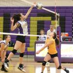 Shorecrest&rsquo;s Hailee Derosier, right, prepares (unsuccessfully) to defend a tip by Jasmine Ford.(Photo by John Fisken)