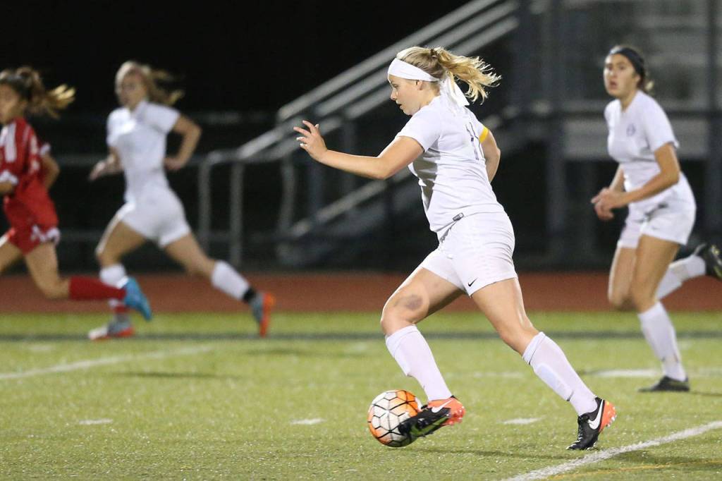 Caylie Etherington, who scored two goals in the match, goes on the attack.(Photo by John Fisken)