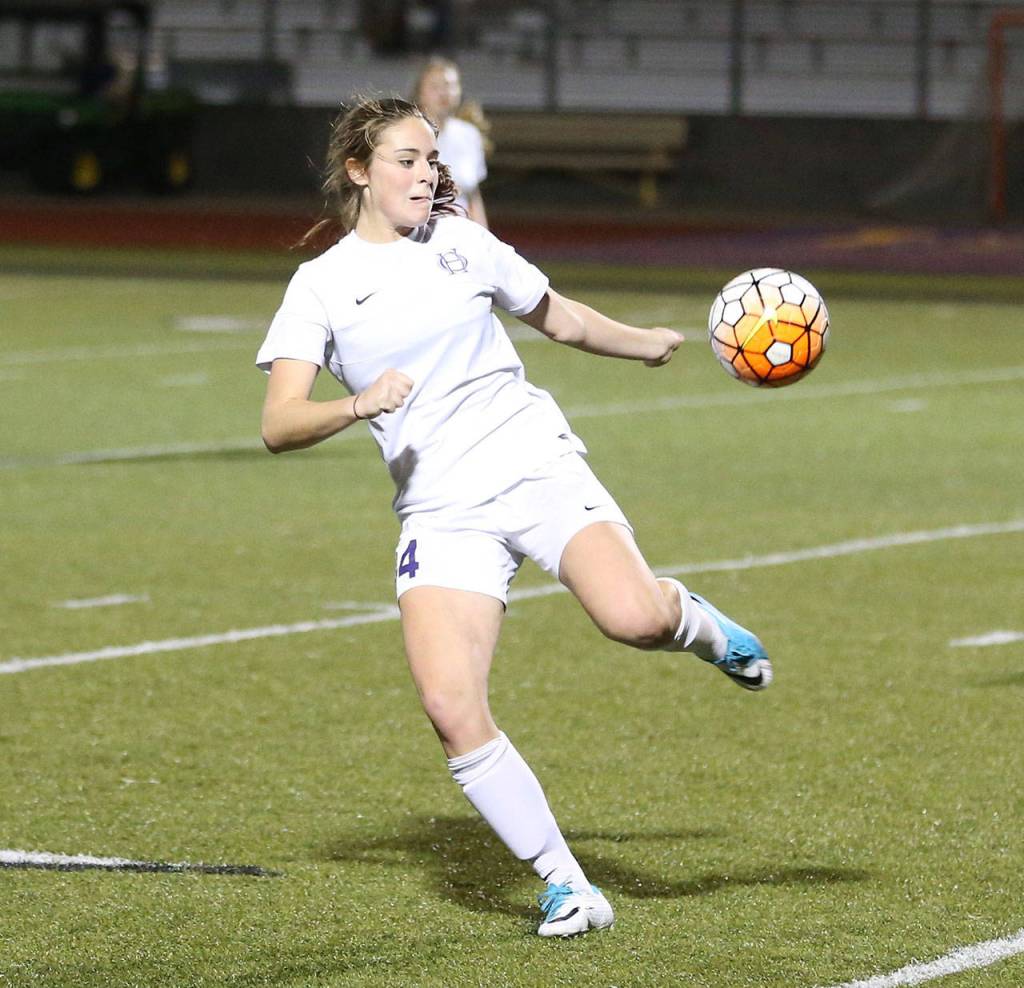 Chloe Wallace takes possession for Oak Harbor.(Photo by John Fisken)