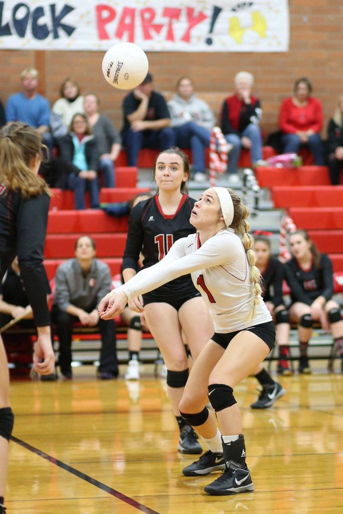 Hope Lodell passes in the Klahowya match. The senior defensive specialist led the Wolves in digs in two matches this week.(Photo by John Fisken)