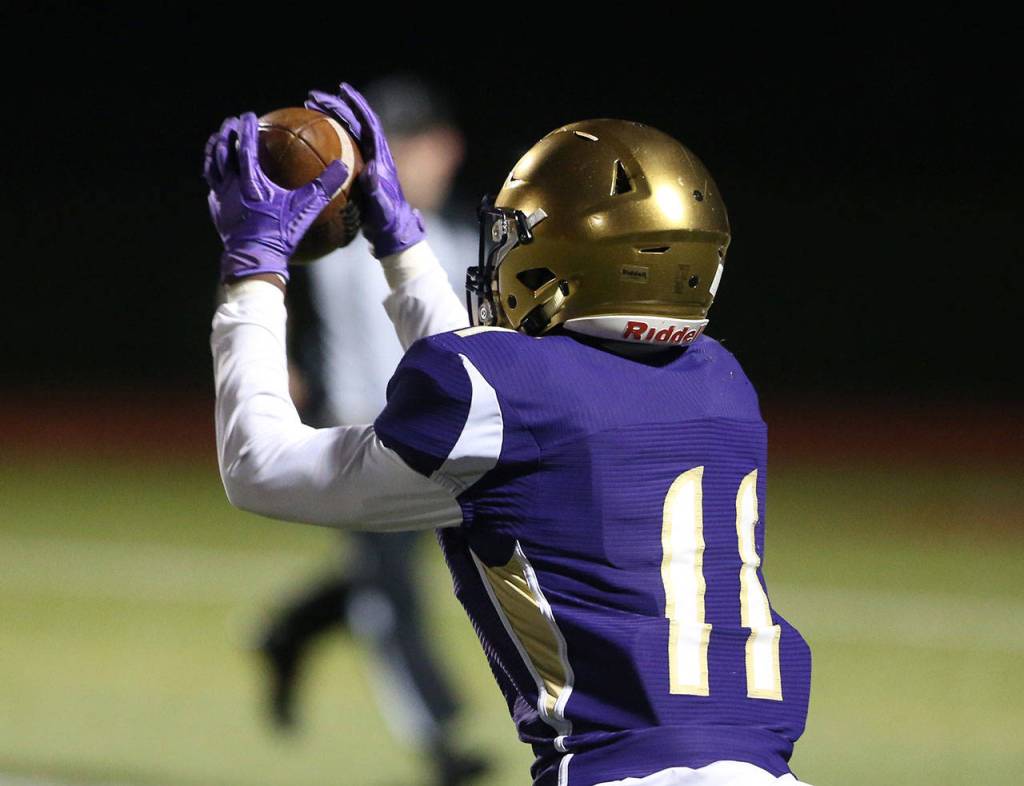 Kyle Nickols hauls in a pass Thursday.(Photo by John Fisken)