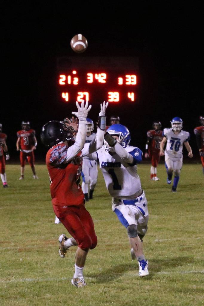 Cameron Toomey-Stout looks in a pass Friday.(Photo by John Fisken)