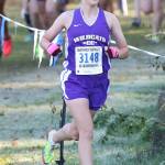 Megan Smith runs to 16th place in the girls varsity race.(Photo by John Fisken)