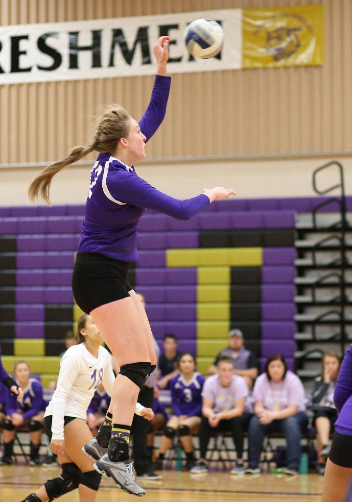 Hailee Blau attacks from the back row Saturday.(Photo by John Fisken)