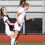 Tia Wurzrainer advances the ball for Coupeville with a header.(Photo by John Fisken)