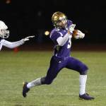 Andrew Miller evades a Seattle Prep defender.(Photo by John Fisken)