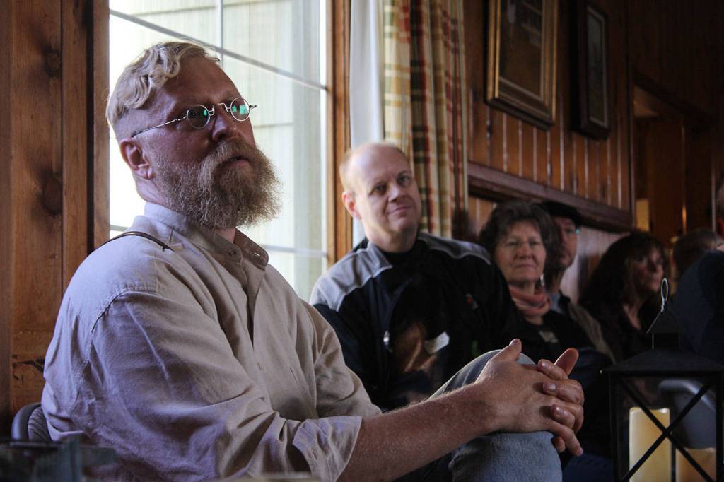 Plein air painter Brian Mahieu (far left) is spearheading the effort to bring creative types together from all over Whidbey Island. &ldquo;Creation is a lonely business,&rdquo; he told the gathering of some 80 people.