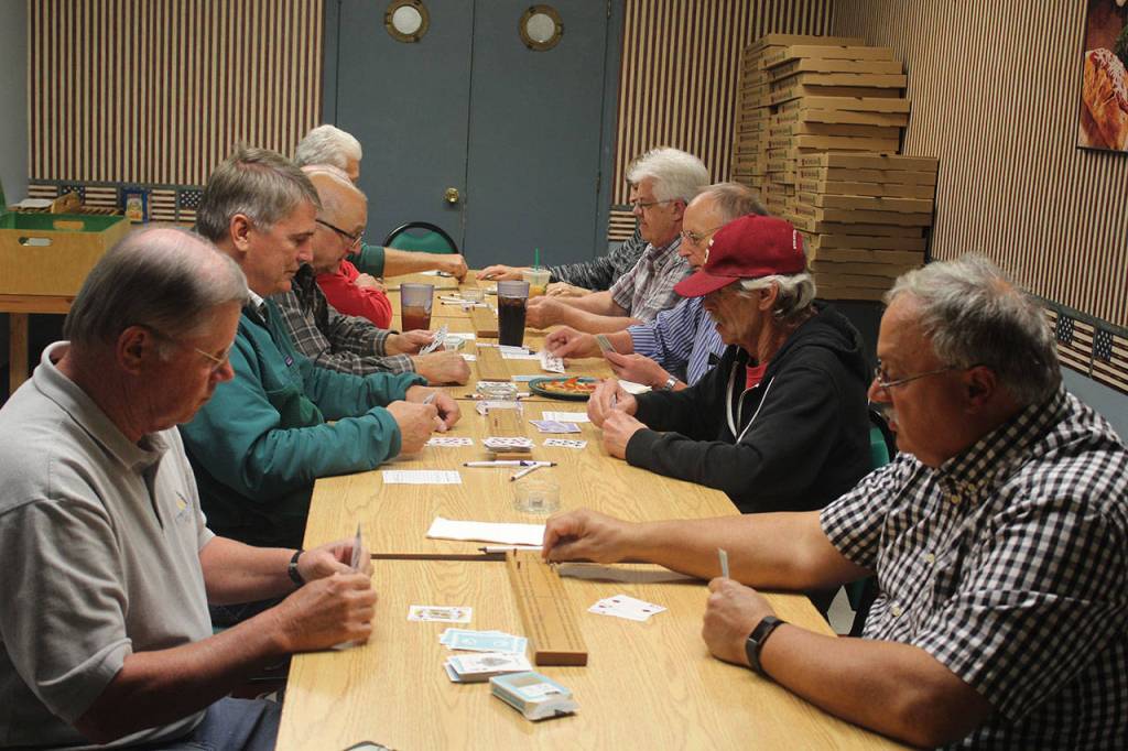 A cribbage game gets underway as it does every Thursday night atIsland Pizza in Oak Harbor. Between 12 to 20 regulars show up for the weekly gathering of the informal club.