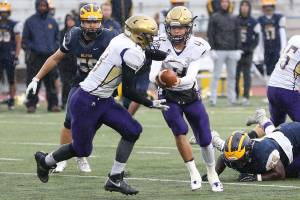 Bellevue runs Oak Harbor out of state playoffs / Football