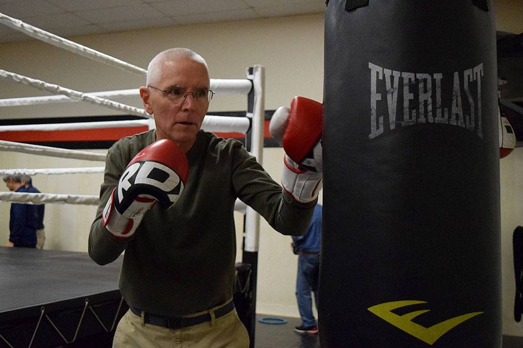 Kyle Jensen / The Record  Boxer David Harbison works the heavy bag during a training session this past Wednesday morning.