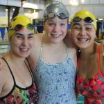 Jillian Pape, center, and Olivia Tungate, right, earned first-team, all-league honors in four events this fall. Taliah Black, left, and Ashleigh Merrill joined the pair on the first-team 200-medley and 200-freestyle relay squads. (Photo by Jim Waller/Whidbey News-Times)