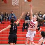 Senior Mikayla Elfrank (23) will help supply some scoring punch for the Wolves this winter. (Photo by John Fisken)