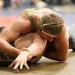 Michael Fisken, top, is one of many returning Oak Harbor wrestlers who placed in the postseason last season. (Photo by John Fisken)