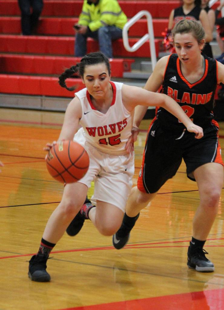 Kalia Littlejohn drives by Blaines Brynn Hallberg.(Photo by Jim Waller/Whidbey News-Times)