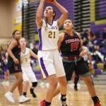 Oak Harbors Mikhaela Cortez puts up a left-handed shot in front of Mountlake Terraces Anyika Nuckles. (Photo by John Fisken)