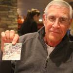 Evan Thompson / The Record                                Joe Simon, a 68-year-old Useless Bay resident, holds up a picture of himself taken during his tour in Vietnam from January-December 1969.