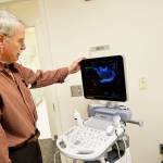 Dr. Robert Burnett examines an ultrasound image at the new WhidbeyHealth Womens Care clinic located on Golide Road in Oak Harbor. This is the first womens health clinic the hospital has had in the city. Photo by Laura Guido/Whidbey News-Times