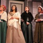 The Madrigal Singers perform old seasonal songs during A Christmas Carol. From left to right: Geri Thomas, Lauren Gutschlag, Tatyana Moore, Danielle Wright. Moore is also co-director, along with Eric George.
