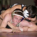Shamus Warden, bottom, tries to break the hold of Mount Vernons Kirill Chirva. (Photo by John Fisken)
