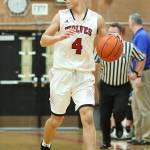 Hunter Smith checks out the trailing defense in the win over the Hurricanes.(Photo by John Fisken)