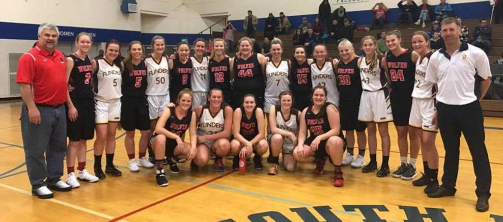 Coupeville and Flinders join for a post-game photo. (Submitted photo)